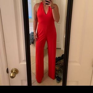 Red jumpsuit from Express. I’m 5’6 it is a little long, but w heels its perfect.